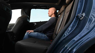 BMW X3 - rear seats with Auto Express Chief reviewer, Alex Ingram
