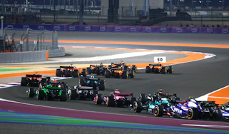 Multiple F1 cars cornering