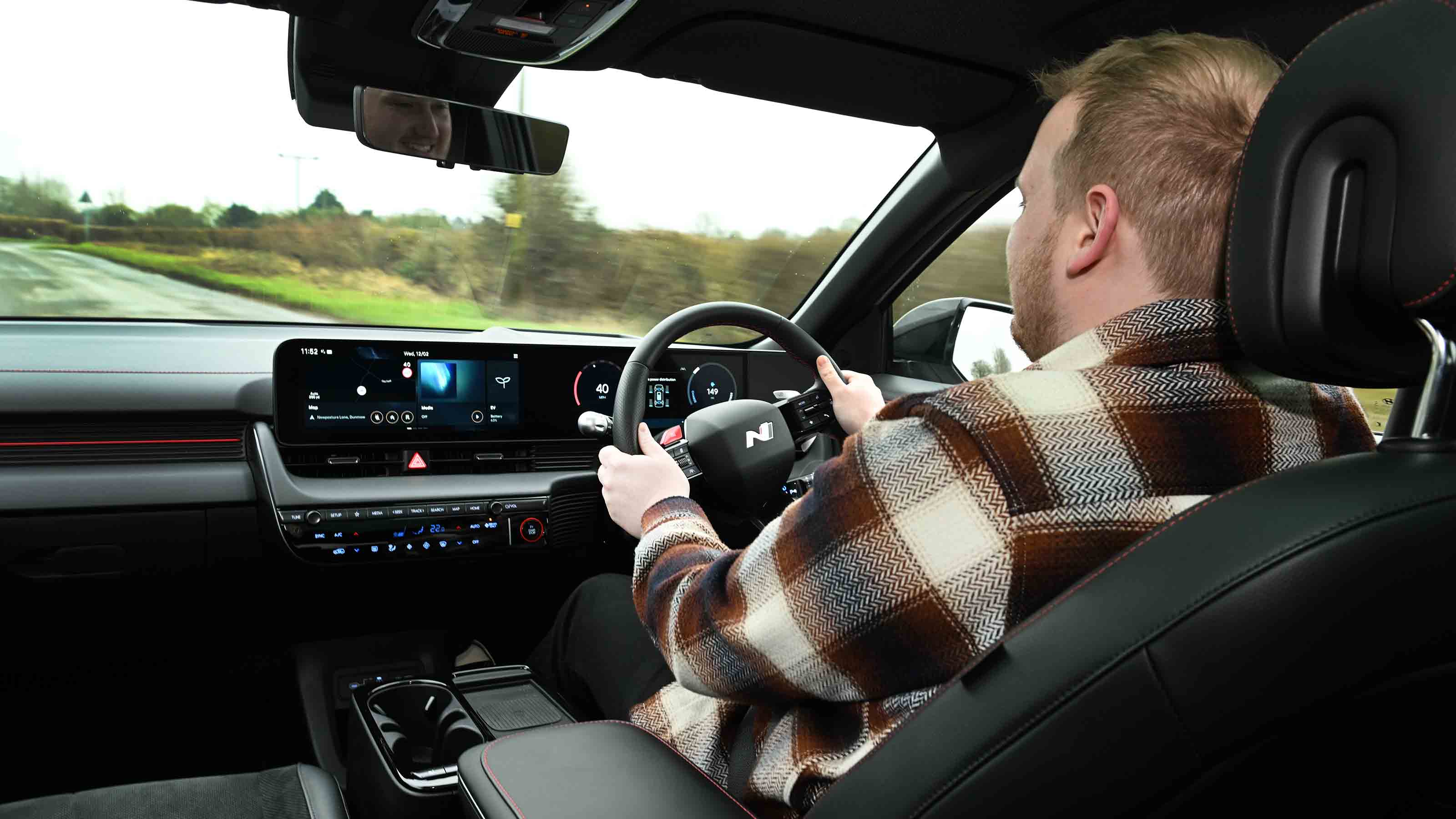 Hyundai Ioniq 5 - interior driving shot with News reporter, Ellis Hyde