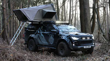 Isuzu D-Max Basecamp - pick-up parked with roof tent open, front