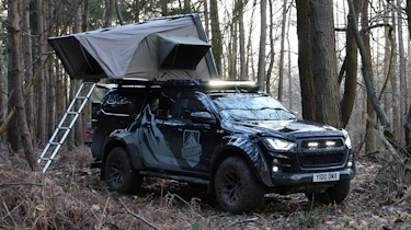 Isuzu D-Max Basecamp - pick-up parked with roof tent open, front