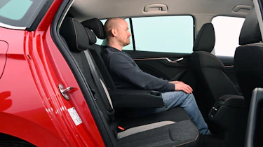 Jaecoo 7 and Skoda Kamiq - Skoda Kamiq rear seats being sat in by Auto Express chief reviewer Alex Ingram