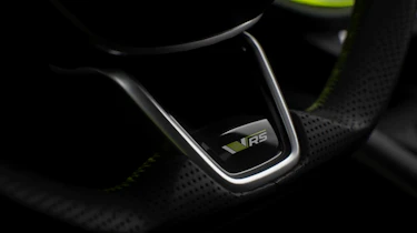 New Skoda Elroq vRS teaser - vRS logo on steering wheel