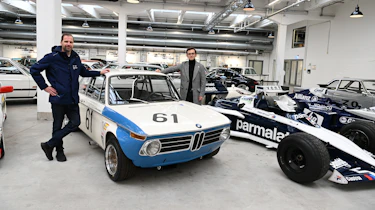 Auto Express consumer reporter Tom Jervis standing next to a BMW 2002