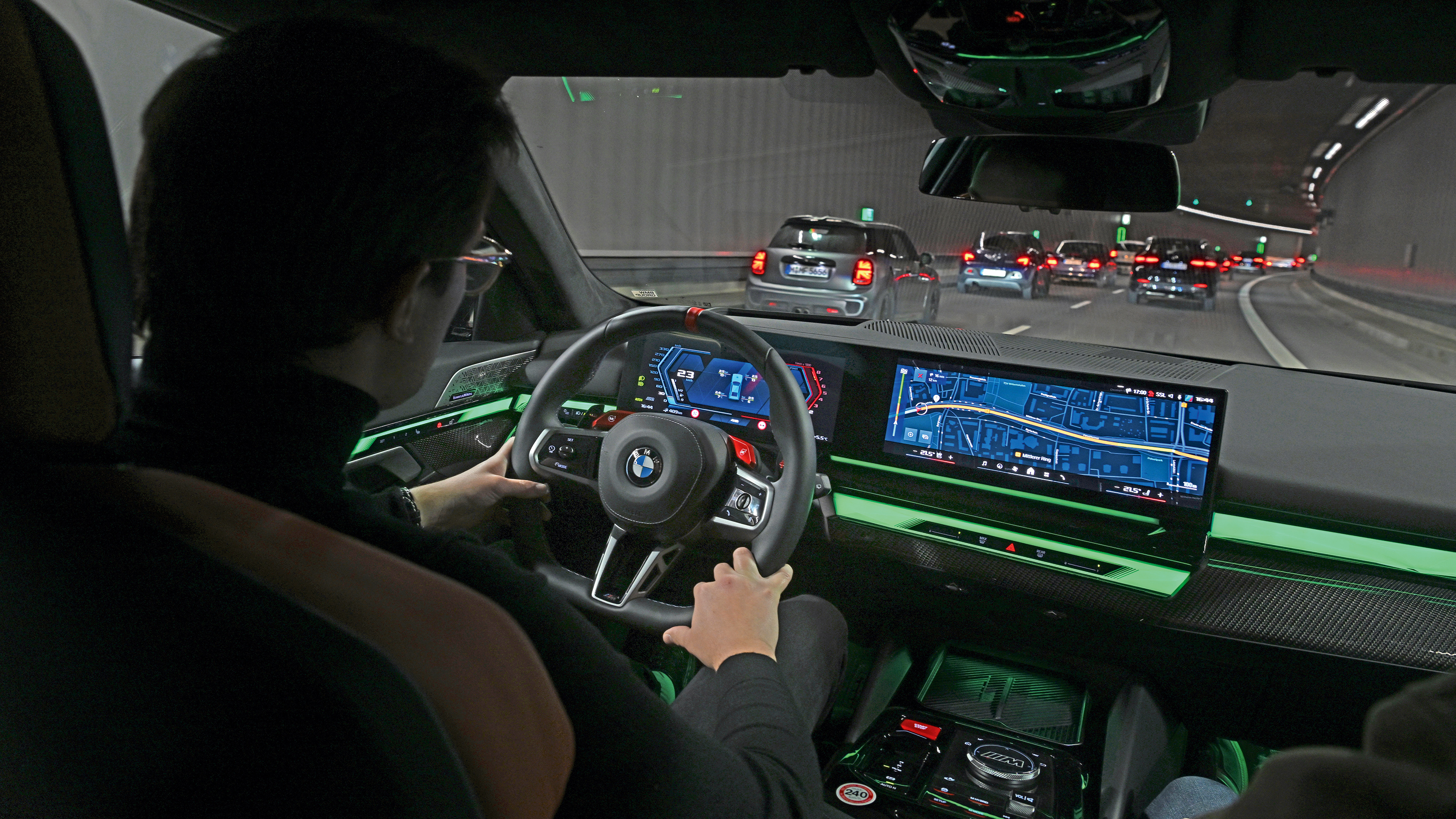 Auto Express consumer reporter Tom Jervis driving a BMW M5