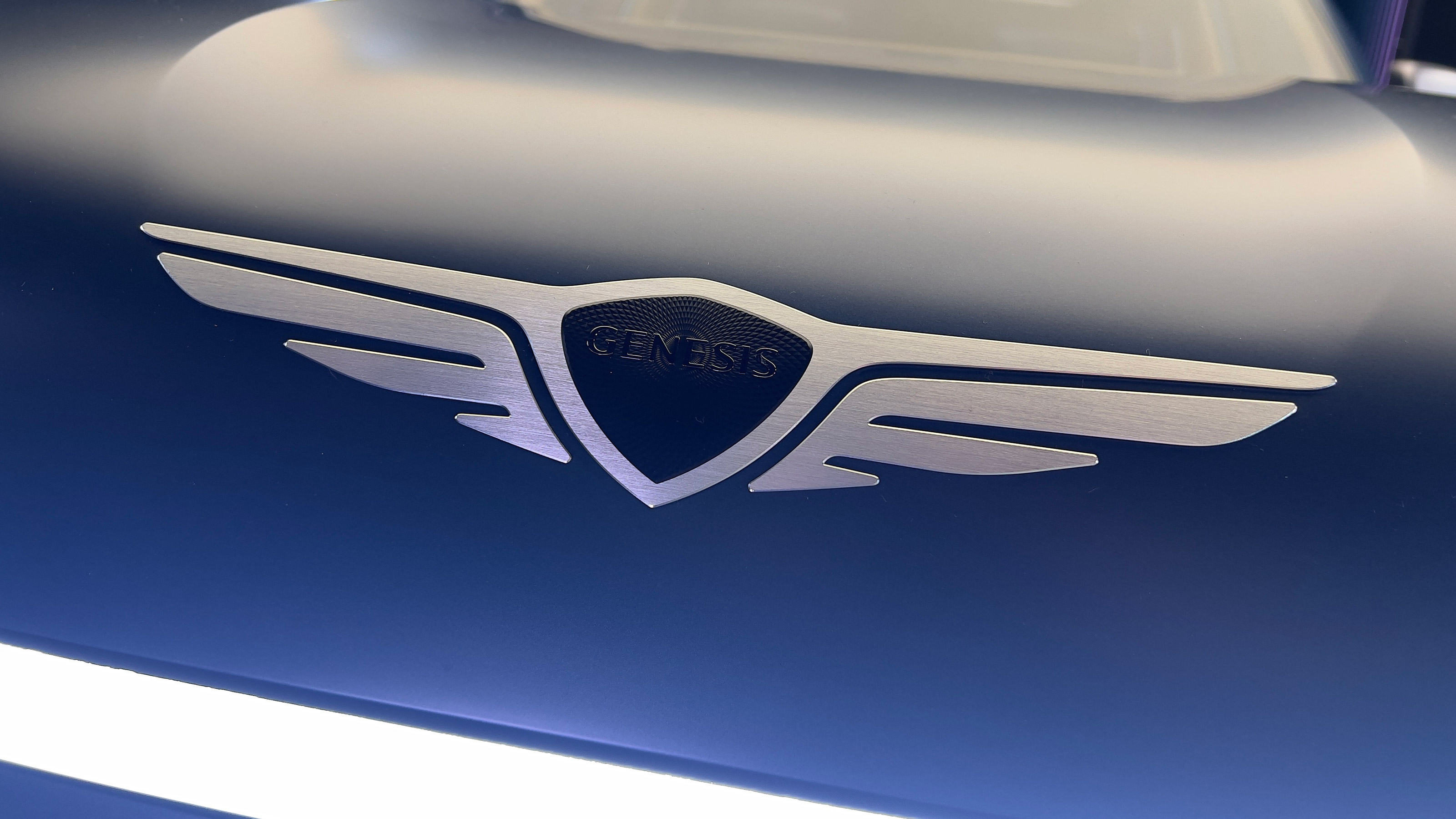 Genesis X Gran Equator studio - Genesis badge