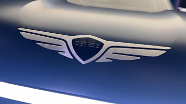 Genesis X Gran Equator studio - Genesis badge