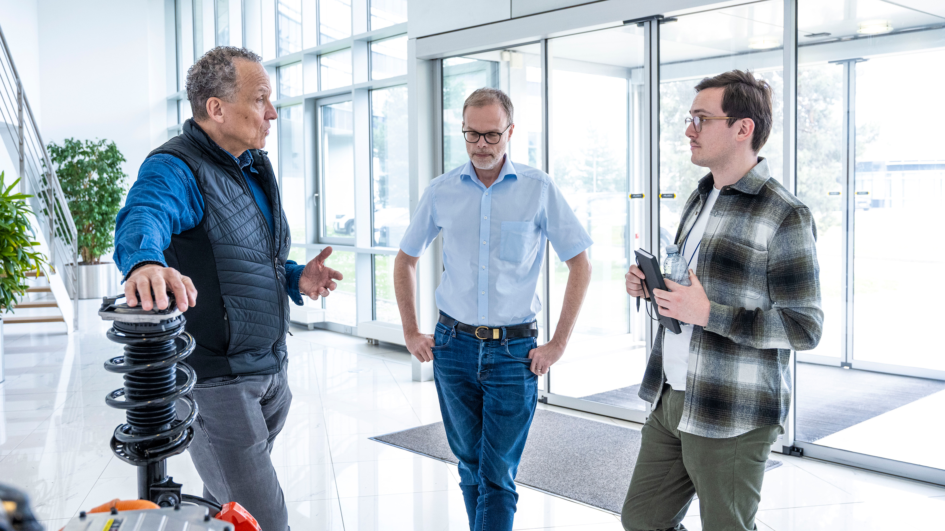 Auto Express consumer reporter Tom Jervis talking to members of the Hyundai N team