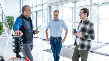 Auto Express consumer reporter Tom Jervis talking to members of the Hyundai N team