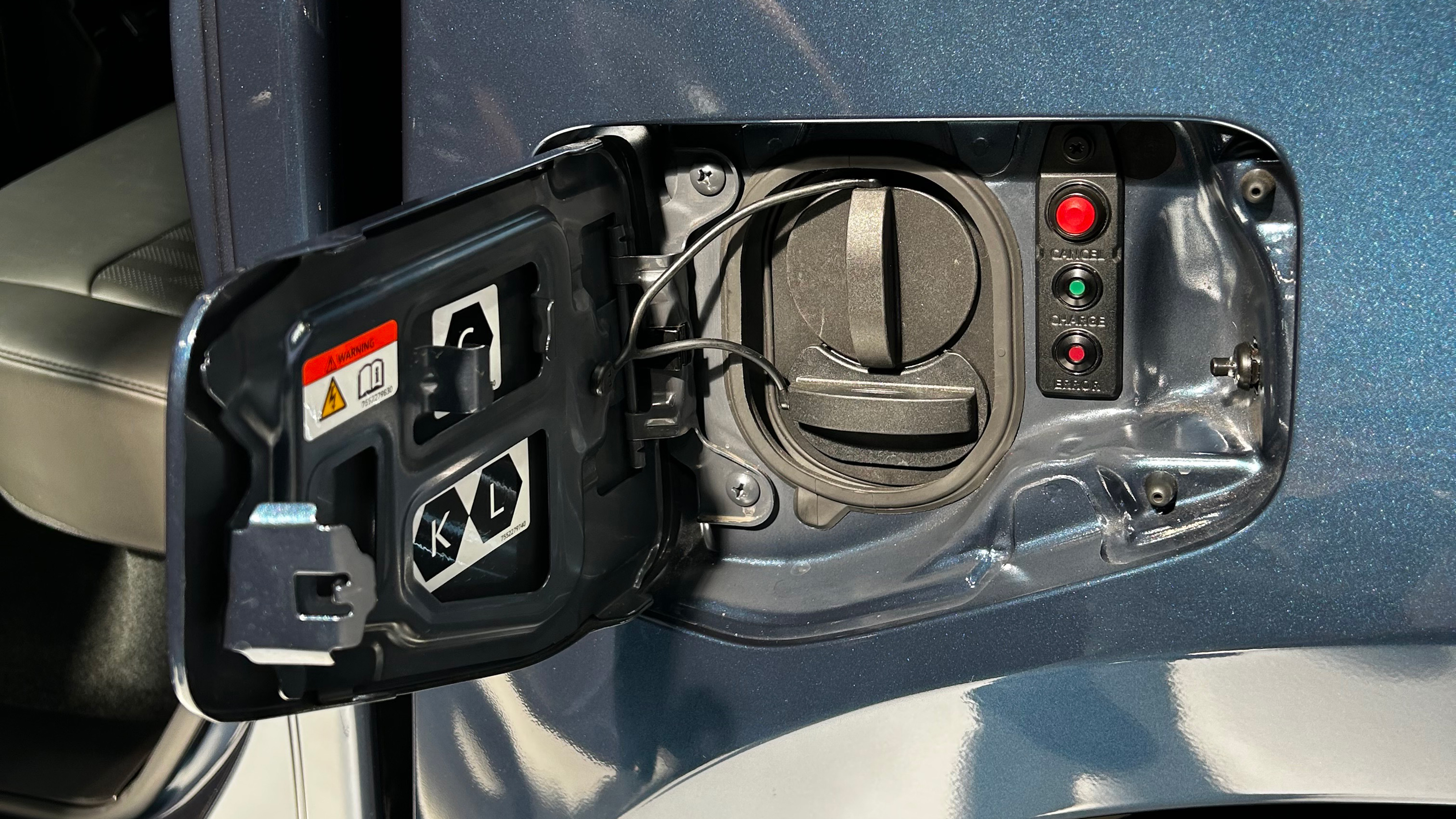 Isuzu D-Max EV on display at 2025 Commercial Vehicle Show - charging port