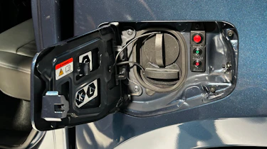 Isuzu D-Max EV on display at 2025 Commercial Vehicle Show - charging port