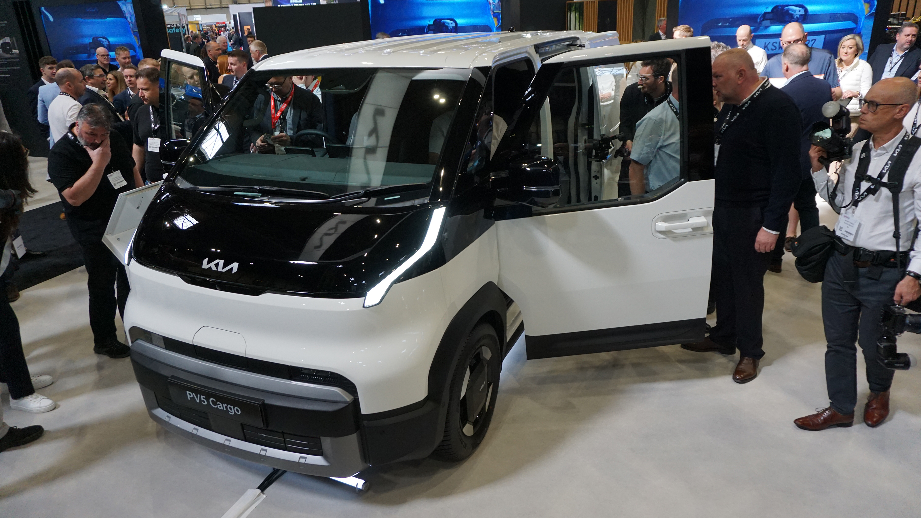 Kia PV5 Cargo on display at Commercial Vehicle Show - front 3/4