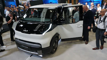 Kia PV5 Cargo on display at Commercial Vehicle Show - front 3/4