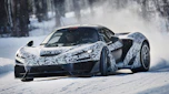 McLaren W1 winter testing - front tracking shot, car drifting on snow