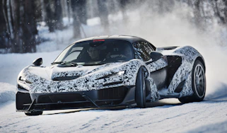 McLaren W1 winter testing - front tracking shot, car drifting on snow