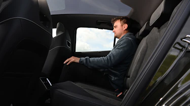 Alastair Crooks sat in the Skoda Enyaq Coupe