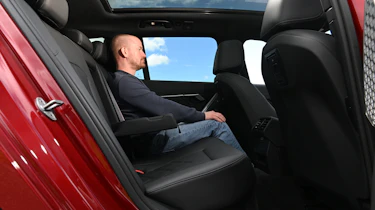 BMW i5 Touring M60 xDrive - rear interior, car being sat in by Auto Express chief reviewer Alex Ingram