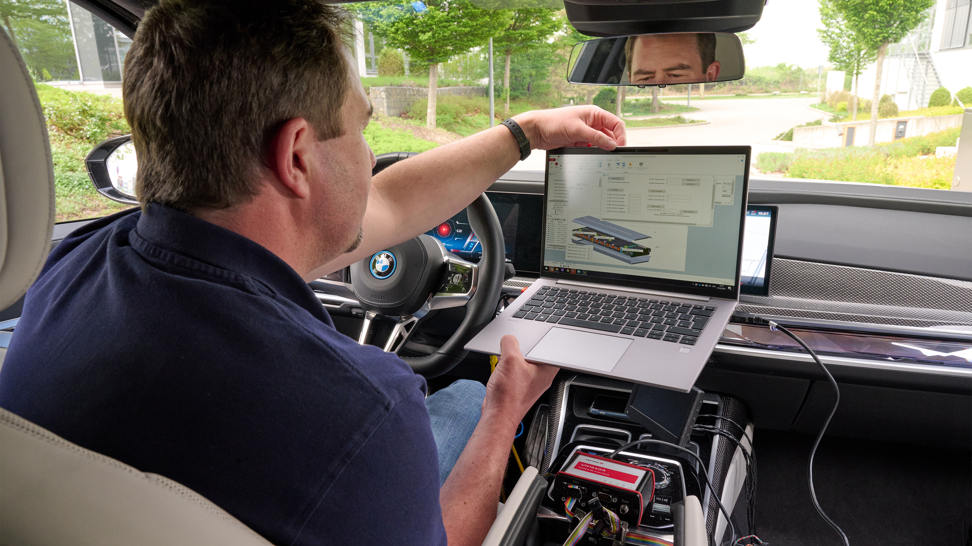 BMW i7 prototype with solid state battery - BMW technician testing inside the car 