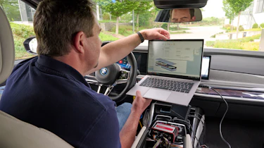 BMW i7 prototype with solid state battery - BMW technician testing inside the car