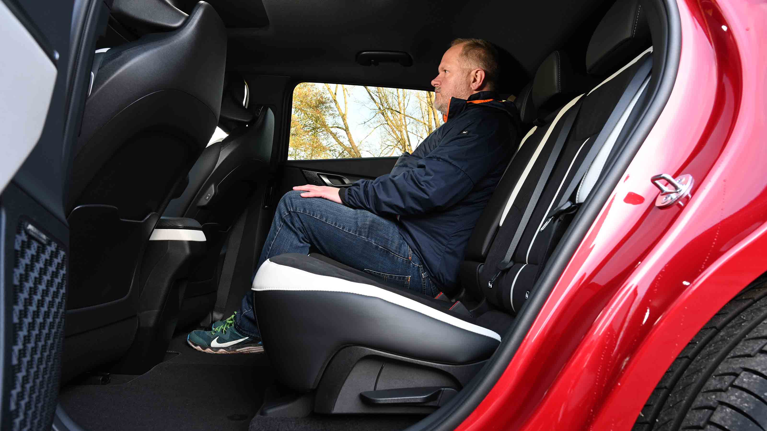 Kia EV6 - rear seats with Auto Express Executive director, Paul Adam