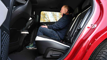 Kia EV6 - rear seats with Auto Express Executive director, Paul Adam