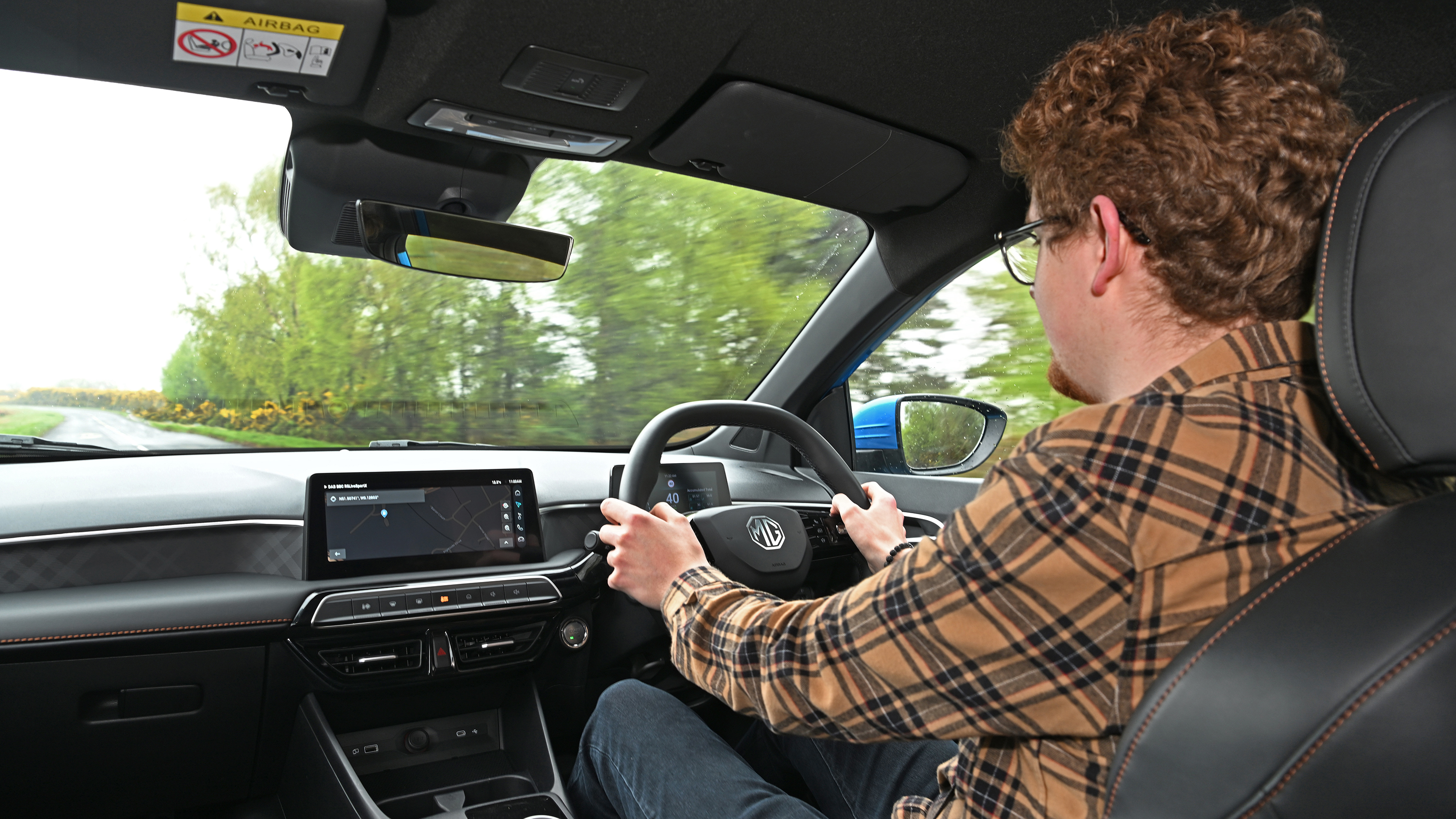 Auto Express content editor Ryan Birch driving the MG3