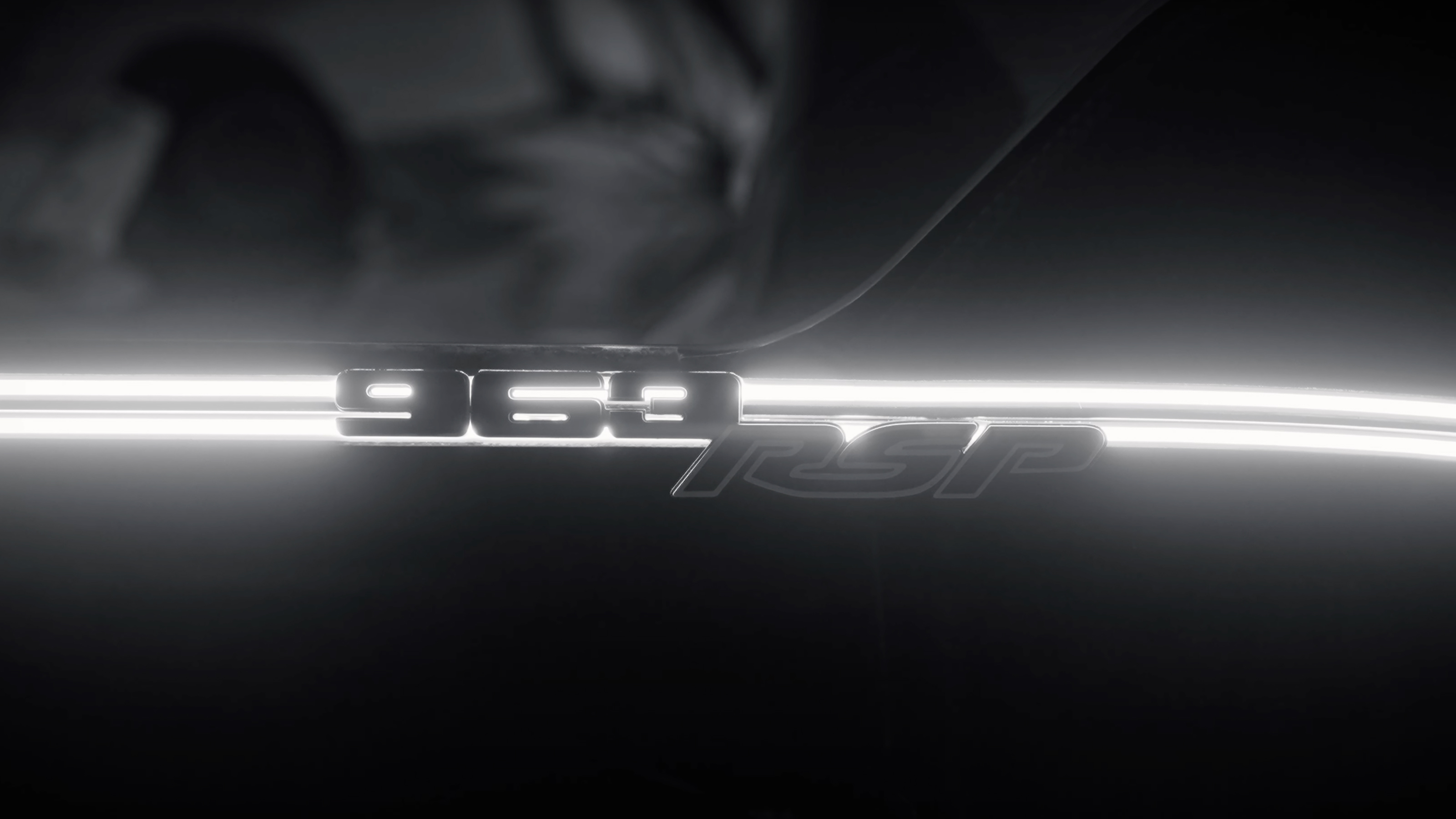 Porsche 963 teaser - name badge