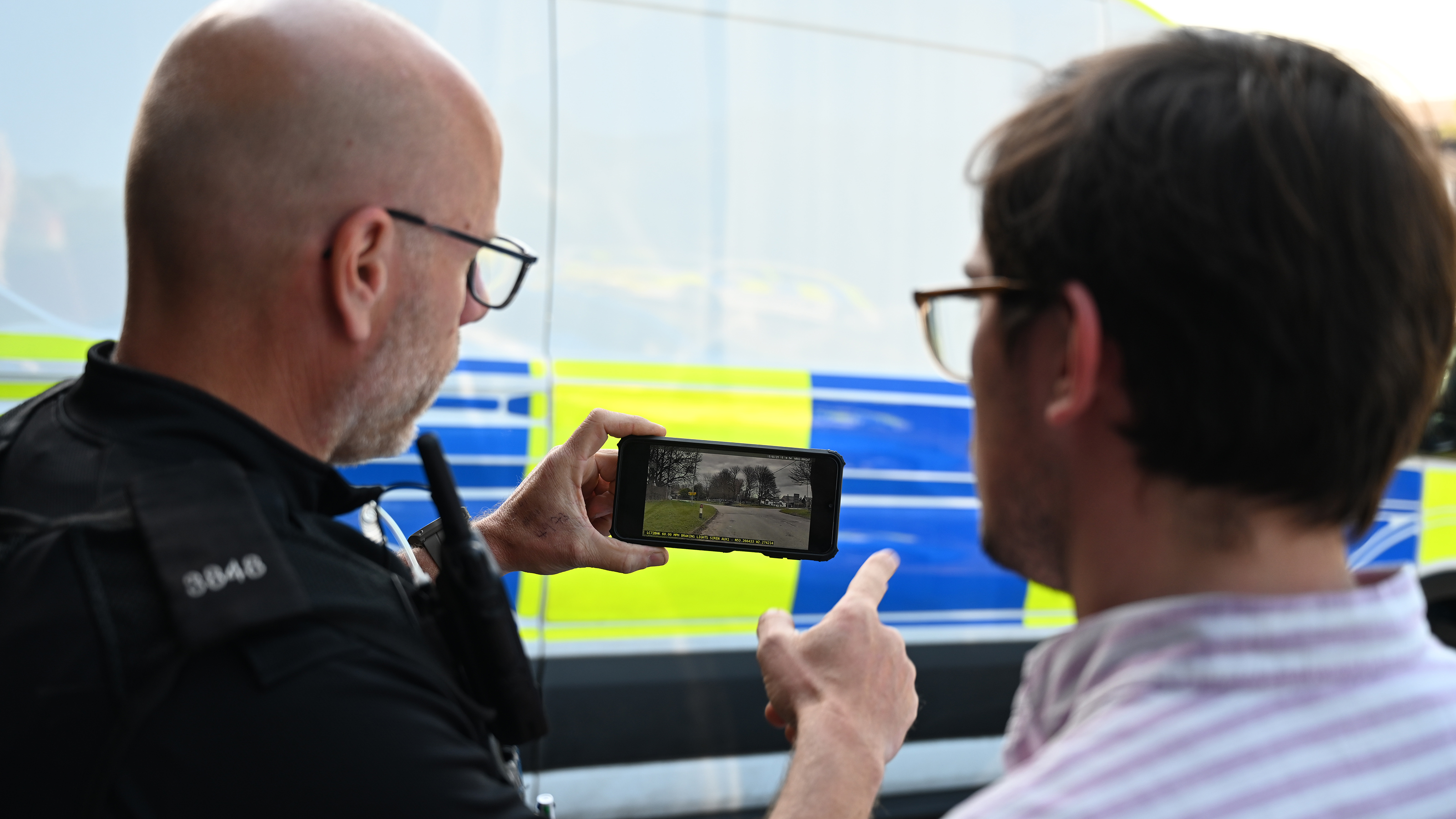 Auto Express consumer reporter Tom Jervis being shown dash cam footage