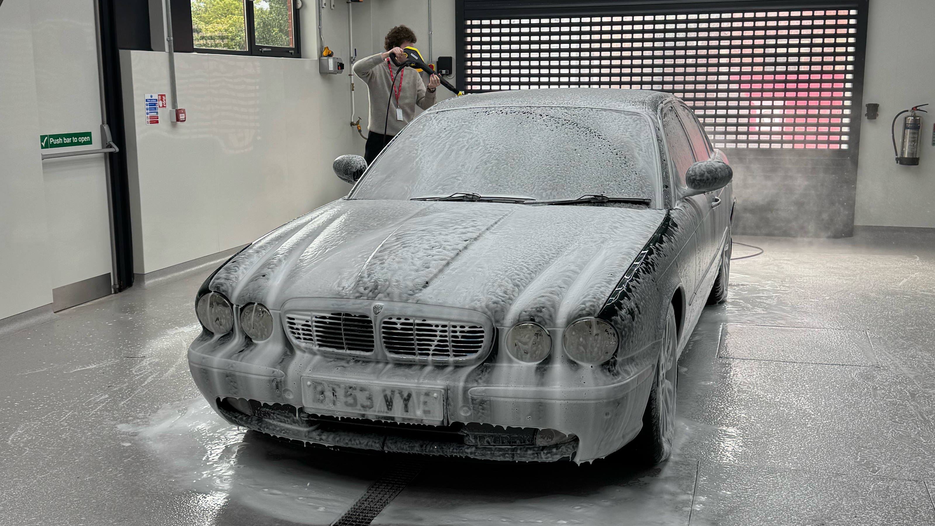 Autoglym Car Care Experience Day - front of Jaguar being cleaned