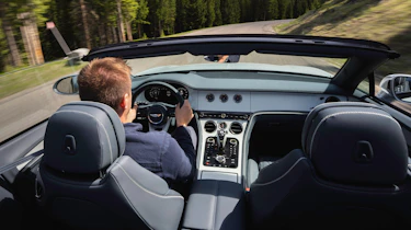Alastair Crooks driving the Bentley Continental GTC Azure