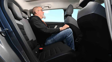 Citroen e-C4 - rear seats, with Senior test editor, Dean Gibson