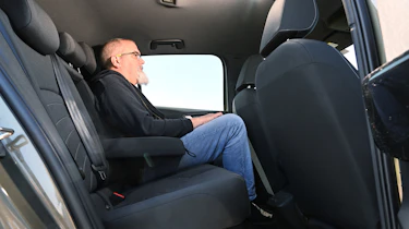 Volkswagen ID.3 - rear seats being sat in by Auto Express senior test editor, Dean Gibson