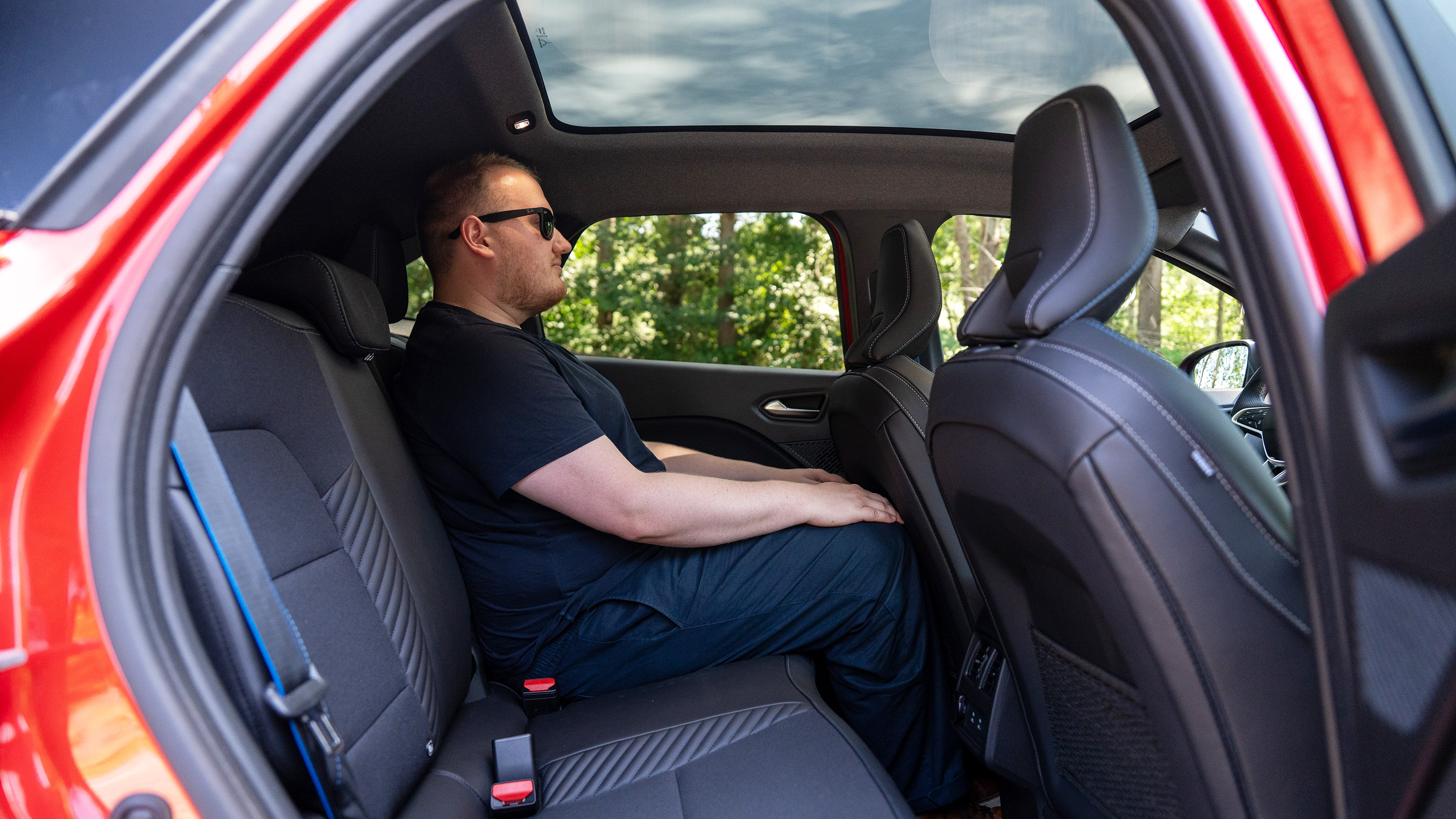 Ellis Hyde sitting in the Renault Symbioz
