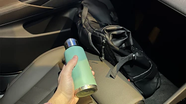 BMW 530e Touring long-term - seat with bag and water bottle
