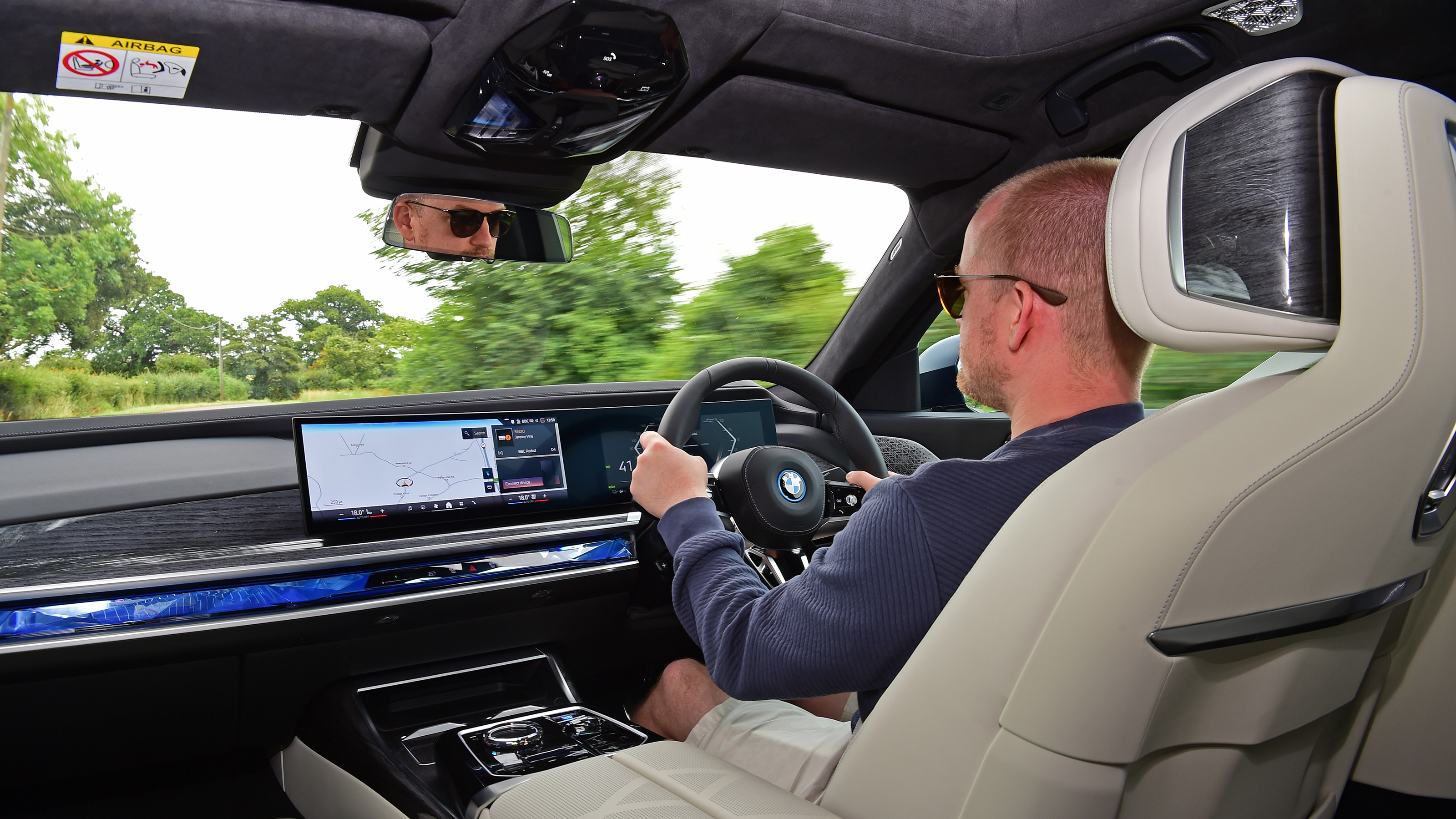 Auto Express chief reviewer Alex Ingram driving the BMW i7