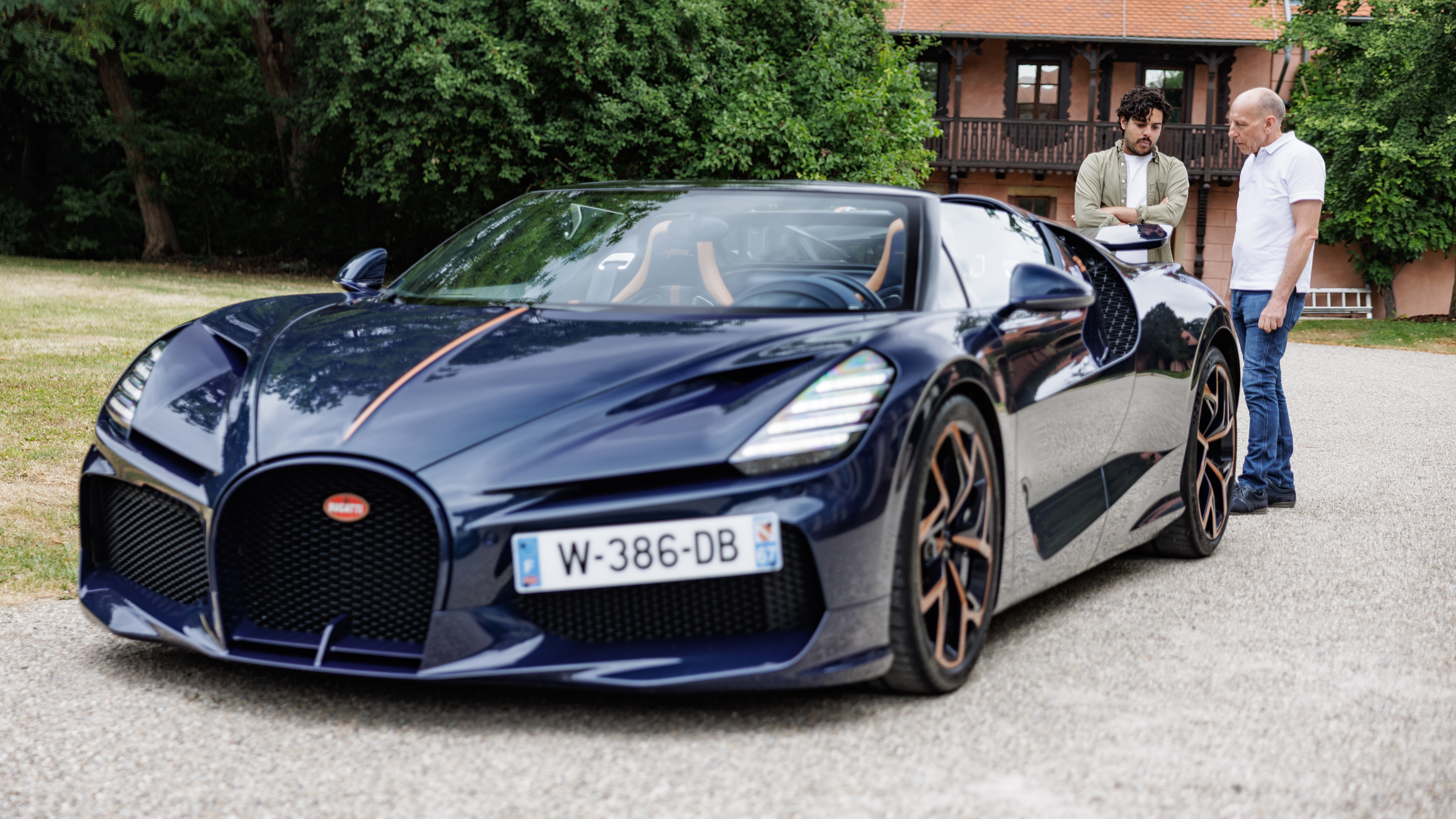 AUto Express staff writer Jordan Katsianis standing behind the Bugatti Mistral