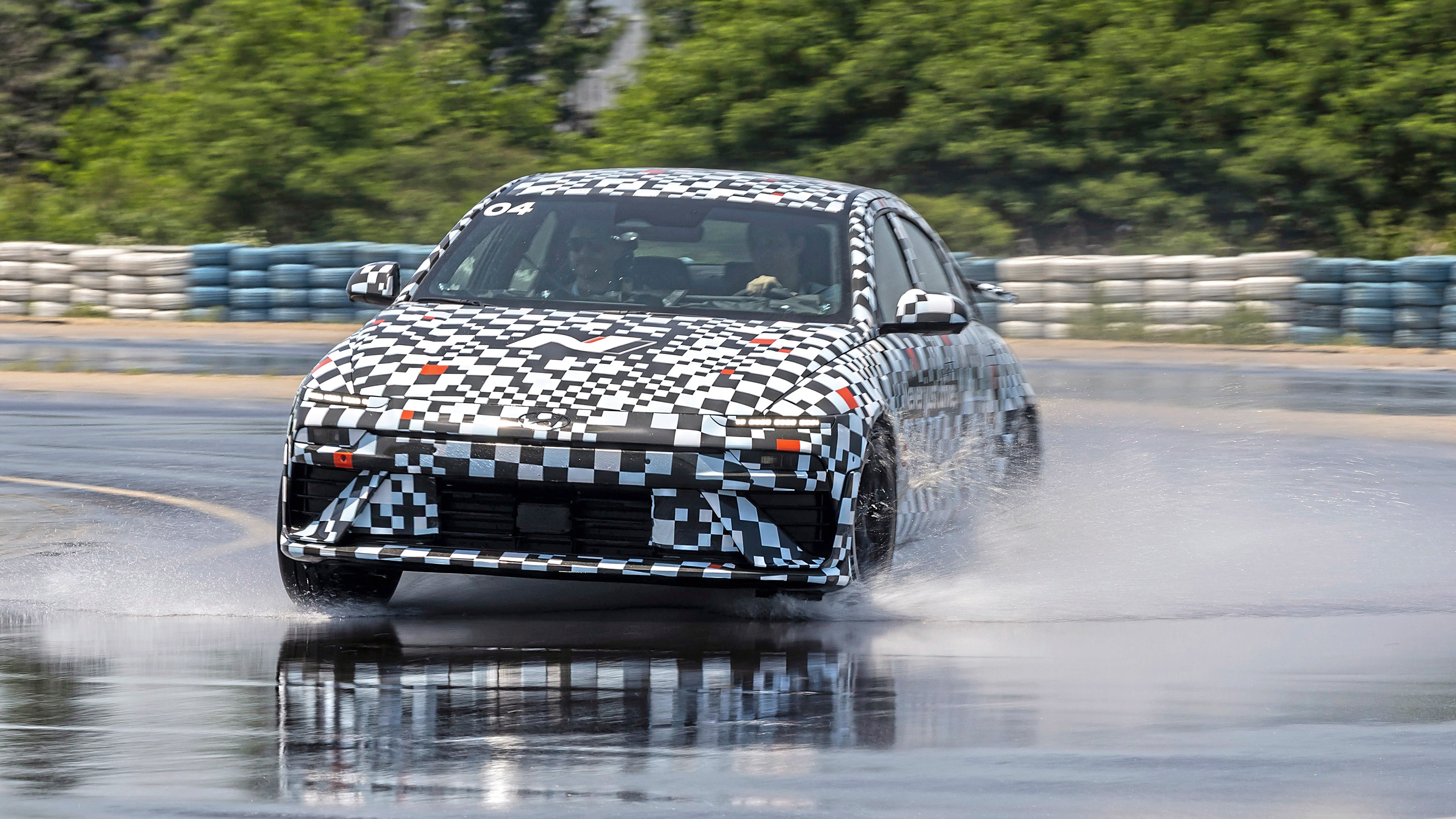 Hyundai Ioniq 6 N prototype - front cornering (wet)