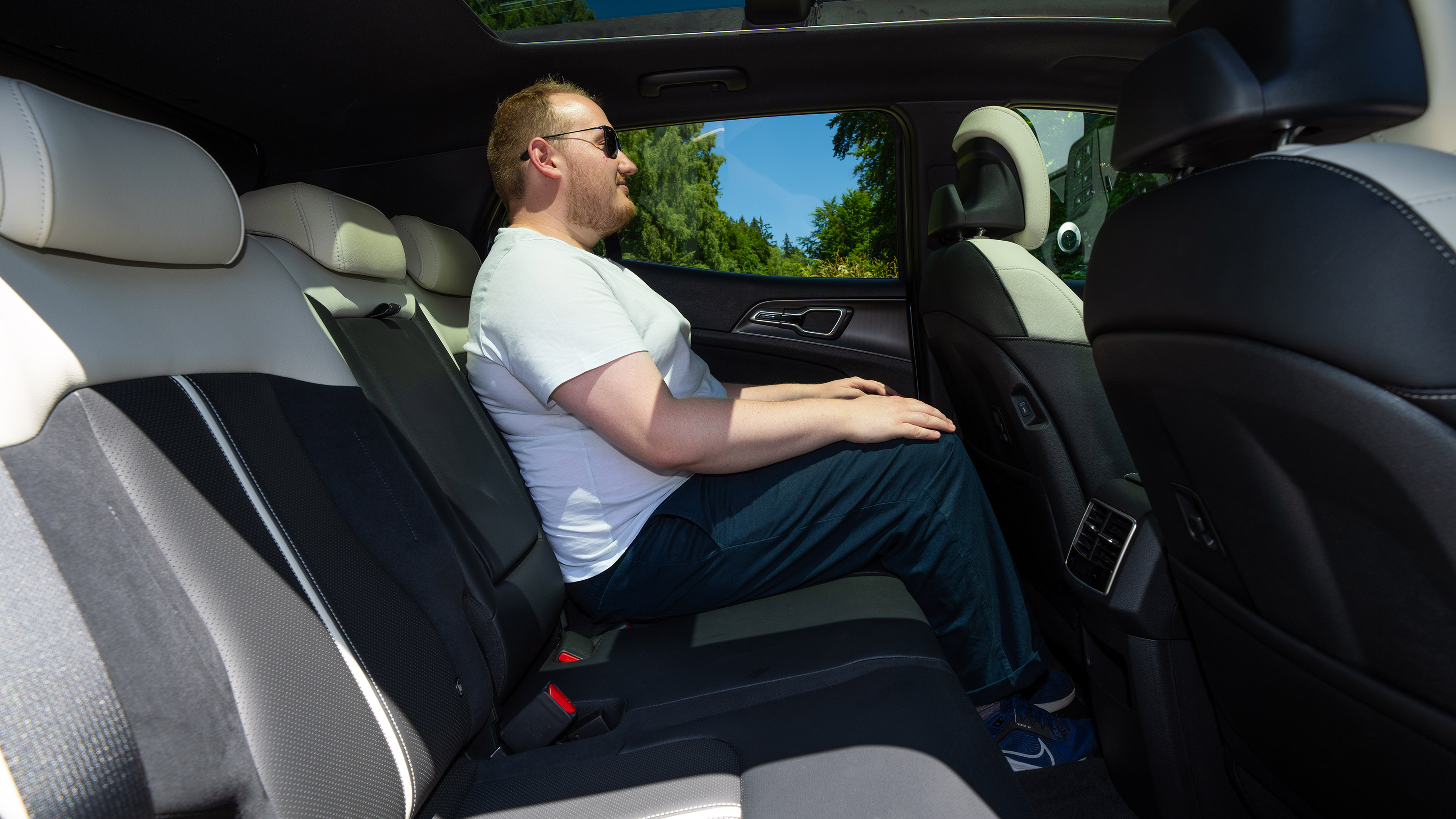 Ellis Hyde sitting in the Kia Sportage