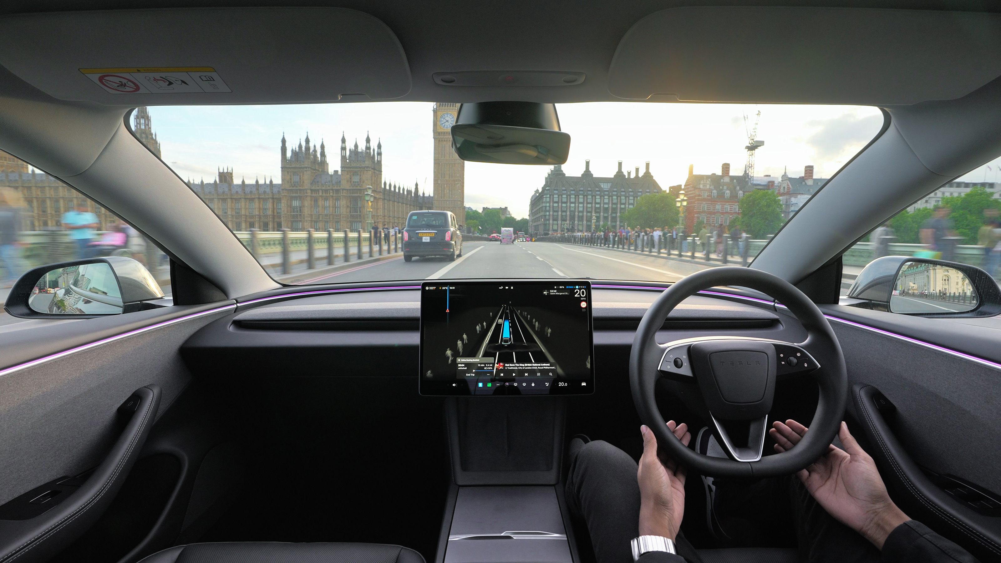Self-driving Tesla Model 3 on Westminster Bridge