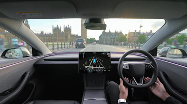 Self-driving Tesla Model 3 on Westminster Bridge