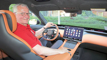 Dirk Branke sitting in the Xiaomi YU7