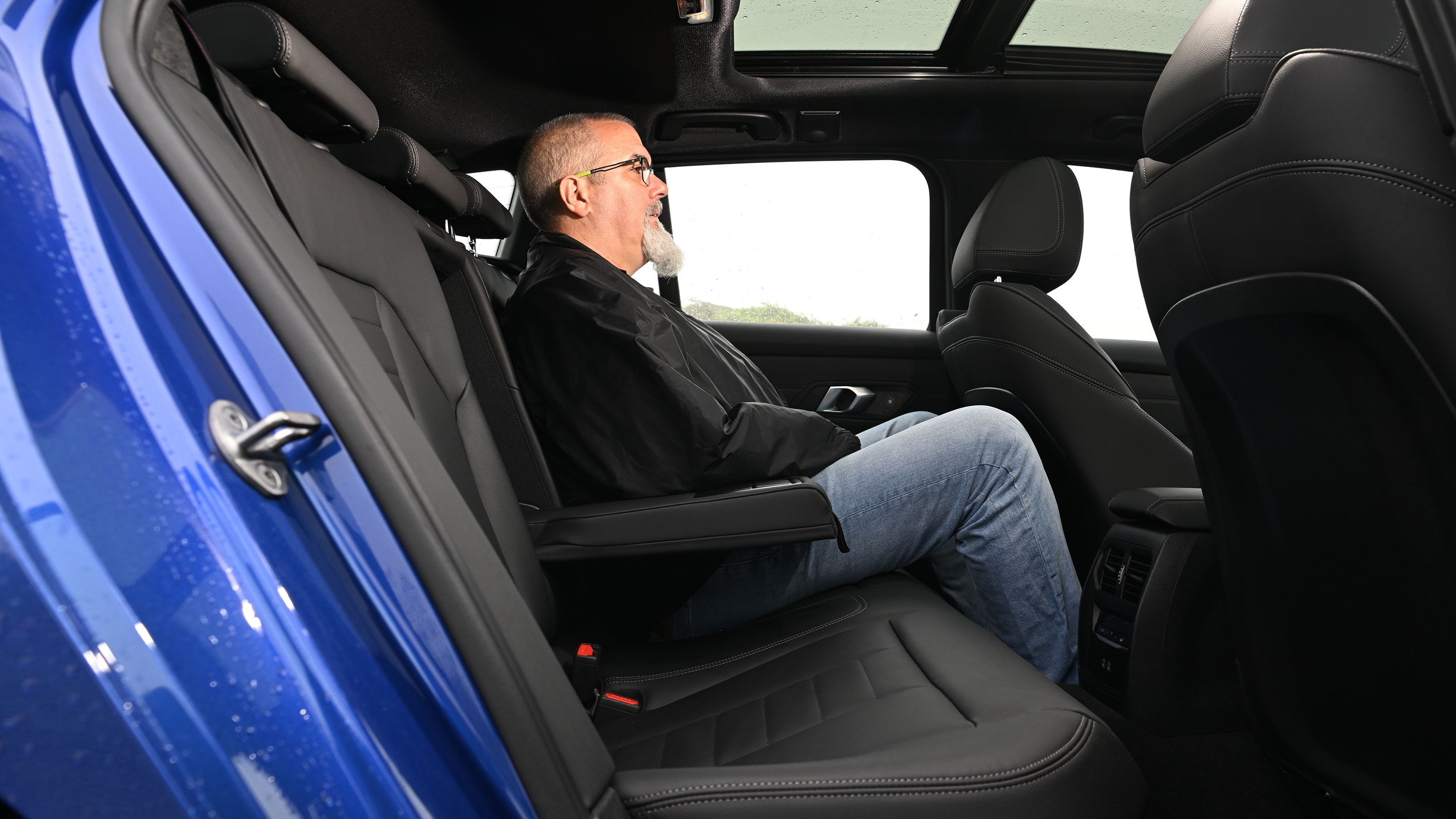 Auto Express senior road test editor Dean Gibson sitting in the BMW 3 Series Touring's back seat