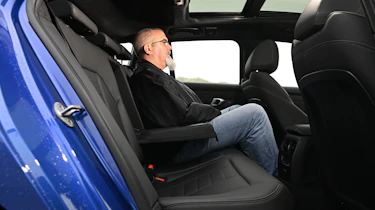 Auto Express senior road test editor Dean Gibson sitting in the BMW 3 Series Touring's back seat