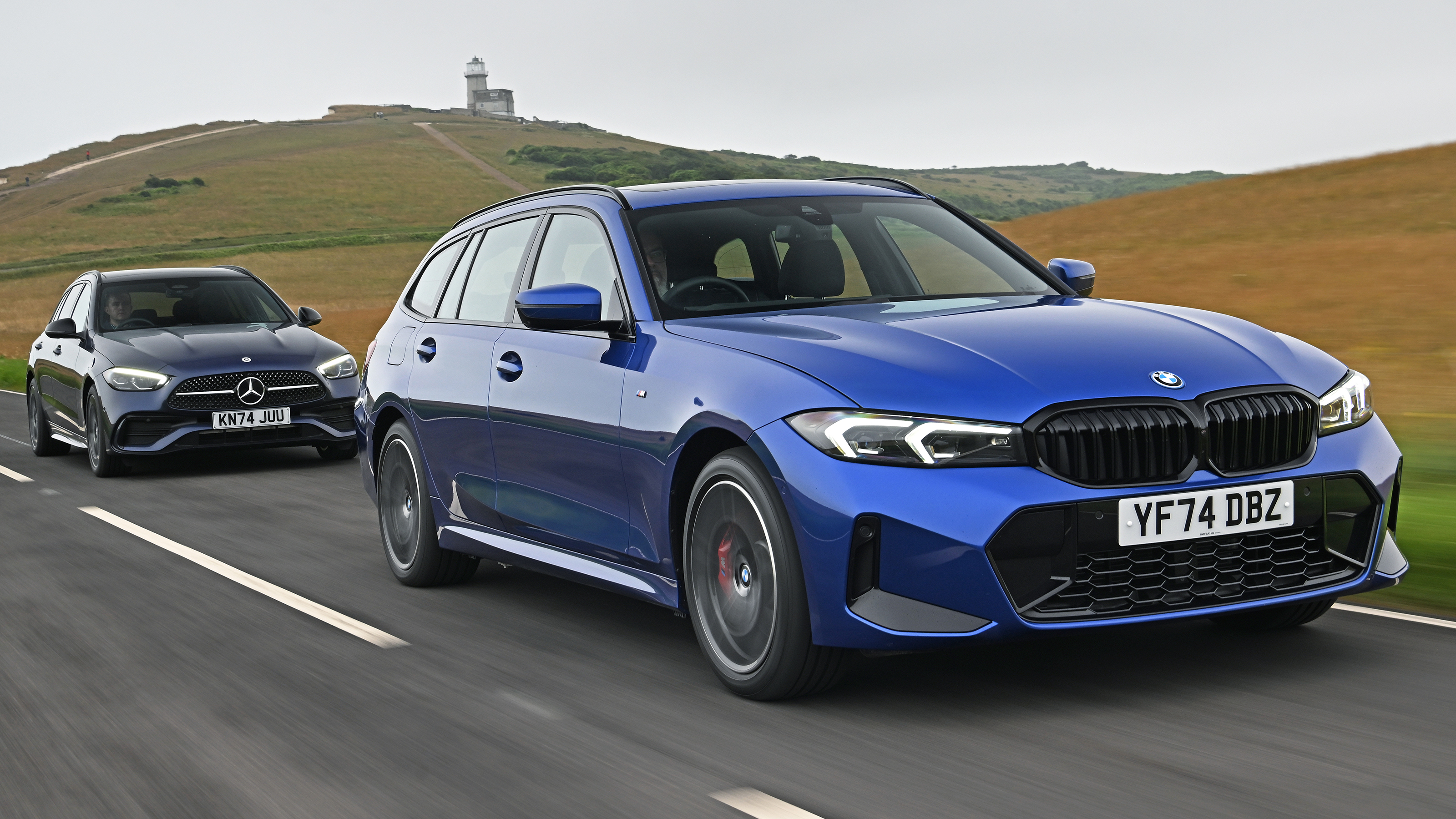 BMW 330e vs Mercedes C 300 e twin test - front angled