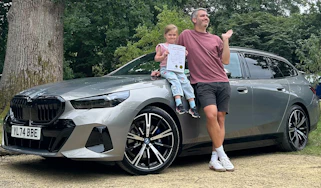 BMW 530e Touring long-term - header with child's school marks