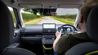 Auto Express news reporter Ellis Hyde driving the Hyundai Inster Cross