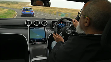 Auto Express senior test editor Dean Gibson driving the Mercedes C 300 e Estate