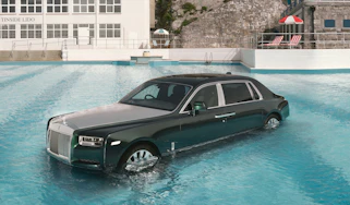 Rolls-Royce Phantom driven into a pool as part of the luxury saloon's 100th birthday celebrations - front