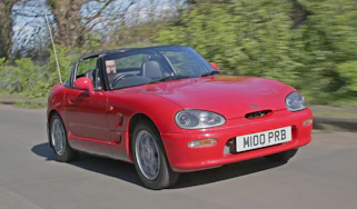 Used Suzuki Cappuccino - front tracking