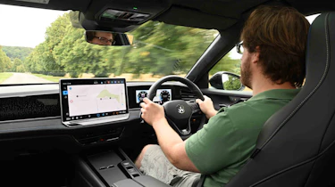Volkswagen Passat - interior driving shot with online reviews editor, Max Adams